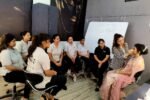 Woman starting her own beauty salon business after completing a cosmetology course